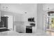 Modern kitchen with stainless steel appliances and white cabinets at 2510 Sheila Ln, North Port, FL 34286