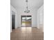 Dining room with tile floors and access to patio at 2510 Sheila Ln, North Port, FL 34286