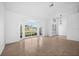 Bright living room with large windows and tile floors at 2510 Sheila Ln, North Port, FL 34286