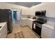 Modern kitchen with stainless steel appliances at 2510 Sheila Ln, North Port, FL 34286