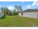 Large grassy backyard with privacy fence at 2510 Sheila Ln, North Port, FL 34286