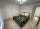 Cozy bedroom with a full-size bed and charming decor at 2510 Sheila Ln, North Port, FL 34286