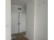 Modern hallway with two white doors and light gray walls at 3850 Pompano Se Dr # 2, St Petersburg, FL 33705