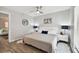 Bright and airy main bedroom with king-size bed and updated flooring at 8901 Blind Pass Rd # 228, St Pete Beach, FL 33706