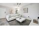 Living Room with white couch and coffee table at 8901 Blind Pass Rd # 228, St Pete Beach, FL 33706