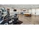 Community room with gym equipment and pool table at 8901 Blind Pass Rd # 228, St Pete Beach, FL 33706