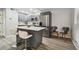 Modern kitchen with stainless steel appliances and an island at 8901 Blind Pass Rd # 228, St Pete Beach, FL 33706