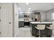 Modern kitchen with stainless steel appliances and gray cabinets at 8901 Blind Pass Rd # 228, St Pete Beach, FL 33706
