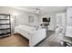 Living room with white couch and modern decor at 8901 Blind Pass Rd # 228, St Pete Beach, FL 33706