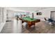 Community room featuring a pool table and exercise machines at 8901 Blind Pass Rd # 228, St Pete Beach, FL 33706