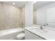Clean bathroom with beige tile and a white vanity at 5381 Ulysses St, Port Charlotte, FL 33981