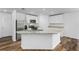Island kitchen with granite countertops and stainless steel appliances at 5381 Ulysses St, Port Charlotte, FL 33981