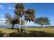 Peaceful waterfront view with picnic tables at 5381 Ulysses St, Port Charlotte, FL 33981