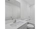 Clean bathroom with white vanity, bathtub, and shower at 5389 Ulysses St, Port Charlotte, FL 33981