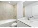 Bathroom featuring a bathtub, toilet and modern vanity at 12157 Shellnut Ave, Port Charlotte, FL 33981