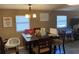 Dining area with table and chairs, near living room at 36940 Howard Ave, Dade City, FL 33525