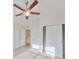 Bedroom with a ceiling fan and vaulted ceiling, and natural light through the window at 2220 Kings Palace Dr, Riverview, FL 33578