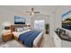 Bedroom featuring modern furniture, a window with blinds and a ceiling fan at 2220 Kings Palace Dr, Riverview, FL 33578