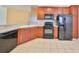 Updated kitchen featuring stainless steel appliances, granite countertops, and tile backsplash at 2220 Kings Palace Dr, Riverview, FL 33578