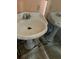 Bathroom with pedestal sinks and tiled floor at 103 W Hamilton Ave, Tampa, FL 33604