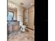 Bathroom features tile flooring, a glass shower, and a wooden vanity with a dark countertop at 3507 Bayshore Blvd # 2001, Tampa, FL 33629