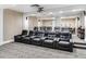 Home theater featuring tiered seating with plush leather recliners and a projector at 3507 Bayshore Blvd # 2001, Tampa, FL 33629