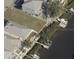 Waterfront lot with neighboring properties and boat docks at 421 Bahama Grande Blvd, Apollo Beach, FL 33572