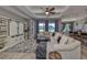 Open living area with a sectional sofa and high ceilings at 421 Bahama Grande Blvd, Apollo Beach, FL 33572