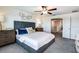 Spacious main bedroom with ensuite bathroom and walk-in closet at 10413 Lavender Aster Trl, San Antonio, FL 33576