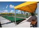 Covered bocce ball courts with benches at 32224 Cannon Rush Dr, San Antonio, FL 33576