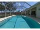 Screened-in pool and patio area for outdoor enjoyment at 4787 Hamlets Grove Dr, Sarasota, FL 34235