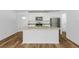Modern kitchen with granite countertops and stainless steel appliances at 13208 Foresman Blvd, Port Charlotte, FL 33981