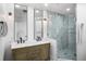 Spa-like bathroom with double vanity, marble tile, and glass shower at 449 S 12Th St # 2405, Tampa, FL 33602