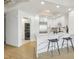 Modern kitchen with white cabinets, marble island, and stainless steel appliances at 449 S 12Th St # 2405, Tampa, FL 33602