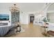 Open concept living room with kitchen, hardwood floors, and wine storage at 449 S 12Th St # 2405, Tampa, FL 33602