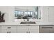 Modern kitchen with white cabinets and marble countertops at 449 S 12Th St # 2405, Tampa, FL 33602