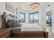 Spacious bedroom with large windows offering city views and an ensuite bathroom at 449 S 12Th St # 2405, Tampa, FL 33602