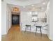 Modern kitchen with marble island and hardwood floors at 449 S 12Th St # 2405, Tampa, FL 33602