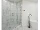 Modern bathroom with frameless glass shower and marble tile at 449 S 12Th St # 2405, Tampa, FL 33602