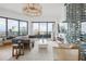 Modern living room with city views, fireplace, and wine storage at 449 S 12Th St # 2405, Tampa, FL 33602