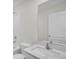 Bathroom with vanity, sink, and a large mirror at 5952 Gillot Blvd, Port Charlotte, FL 33981