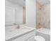 Simple bathroom with a bathtub and white vanity at 5952 Gillot Blvd, Port Charlotte, FL 33981