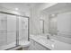 Clean bathroom with a walk-in shower and white vanity at 5952 Gillot Blvd, Port Charlotte, FL 33981