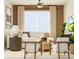 Bright and airy living room with comfortable seating and large windows at 10439 Lavender Aster Trl, San Antonio, FL 33576
