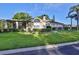Well-maintained home with landscaped lawn and screened porch at 906 Golfview Woods Dr # 906, Ruskin, FL 33573