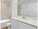 Clean bathroom with tiled shower and vanity at 13315 Flaherty Ave, Port Charlotte, FL 33981