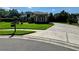 Beautiful home with a well-manicured lawn and a driveway combining concrete and decorative brick accents at 5016 Givendale Ln, Tampa, FL 33647