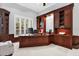 Spacious office with dark wood built-ins and large window offering natural light at 5016 Givendale Ln, Tampa, FL 33647