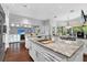 Gourmet kitchen featuring an island, stainless appliances, and ample counter space for cooking and entertaining at 5016 Givendale Ln, Tampa, FL 33647