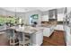 Bright and open kitchen with granite countertops, stainless steel appliances, and eat in bar at 5016 Givendale Ln, Tampa, FL 33647